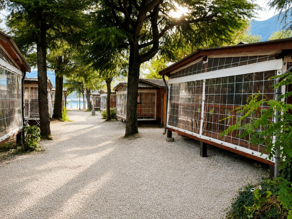 Mobile homes / Chalets te koop Porlezza Noord Italie., Aan zee, Recreatiepark