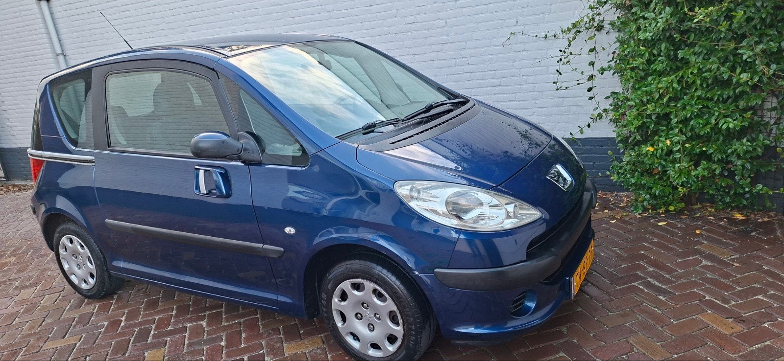 Peugeot 1007 1.4 2-TRONIC 2005 Blauw, Auto's, Peugeot, Stof, 1360 cc, 4 cilinders, Origineel Nederlands
