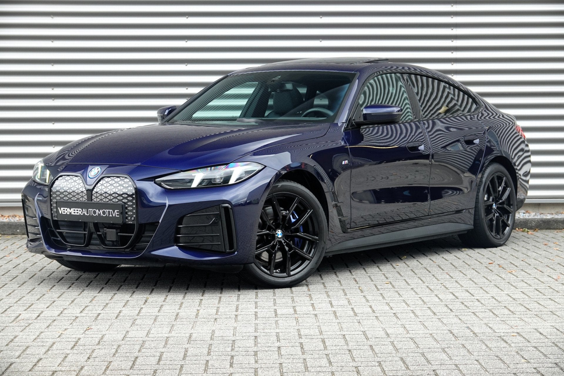 BMW i4 eDrive40 M Sport Edition 84 kWh Comfort Pack | Trekha, Auto's, Achterwielaandrijving, Gebruikt, Zwart, Blauw