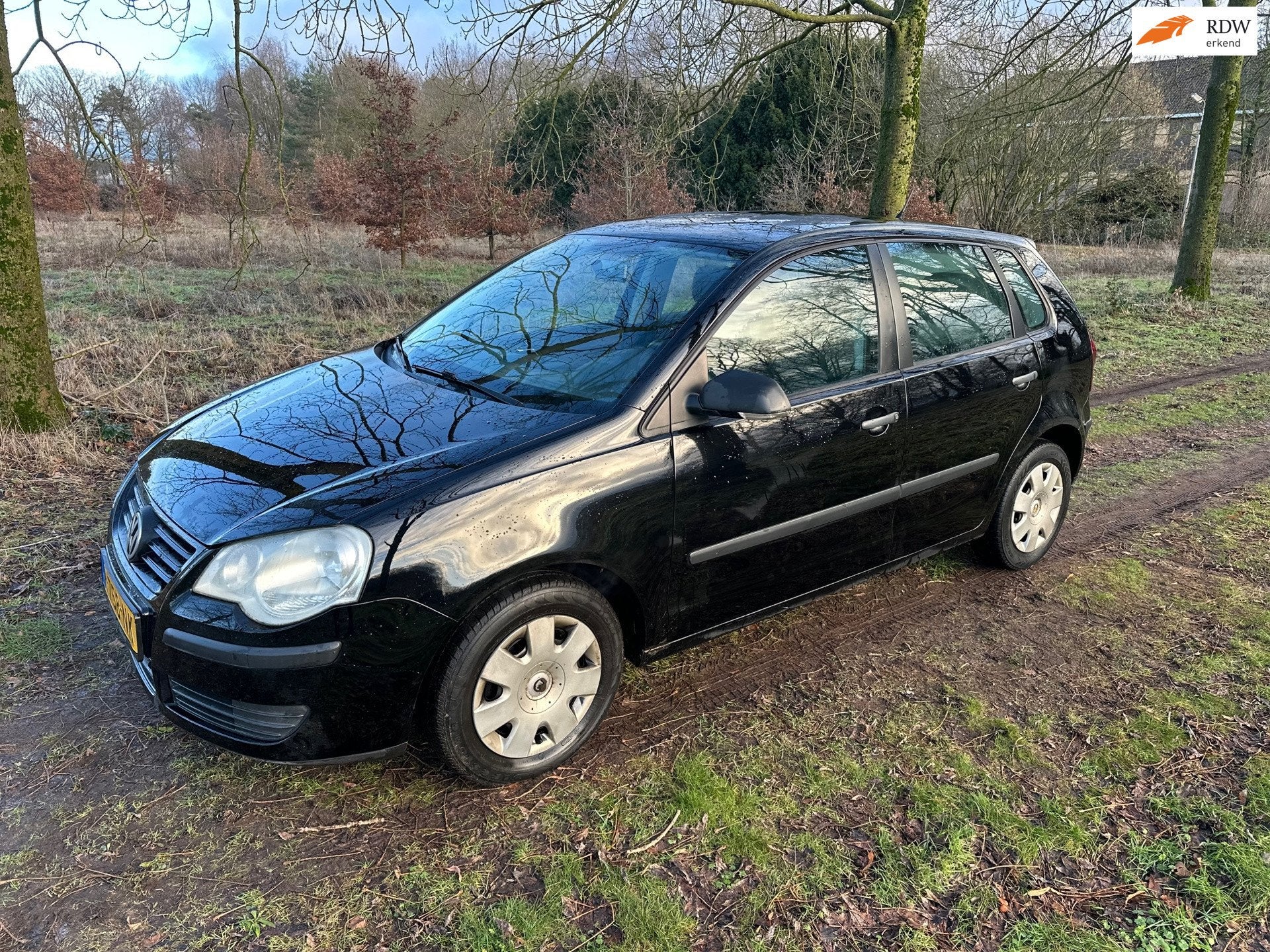 Volkswagen Polo 1.2 Trendline apk t/m 06-08-2026, Auto's, Voorwielaandrijving, 1198 cc, Zwart, Bedrijf