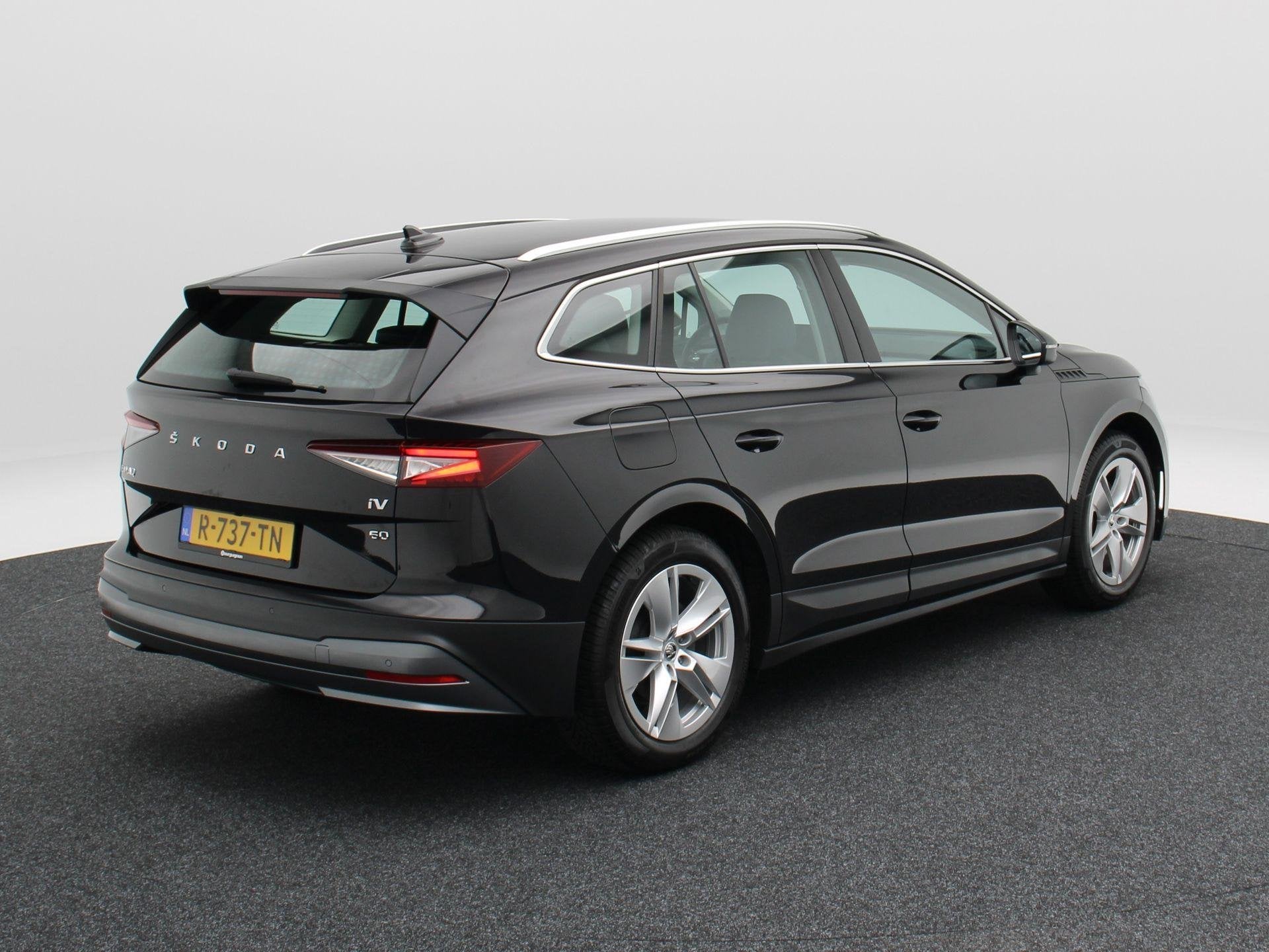 Skoda Enyaq iV 60 180 Pk | Climatronic | Cruise Control | Ca, Auto's, Skoda, Automaat, Achterwielaandrijving, Leder en Stof, Zwart