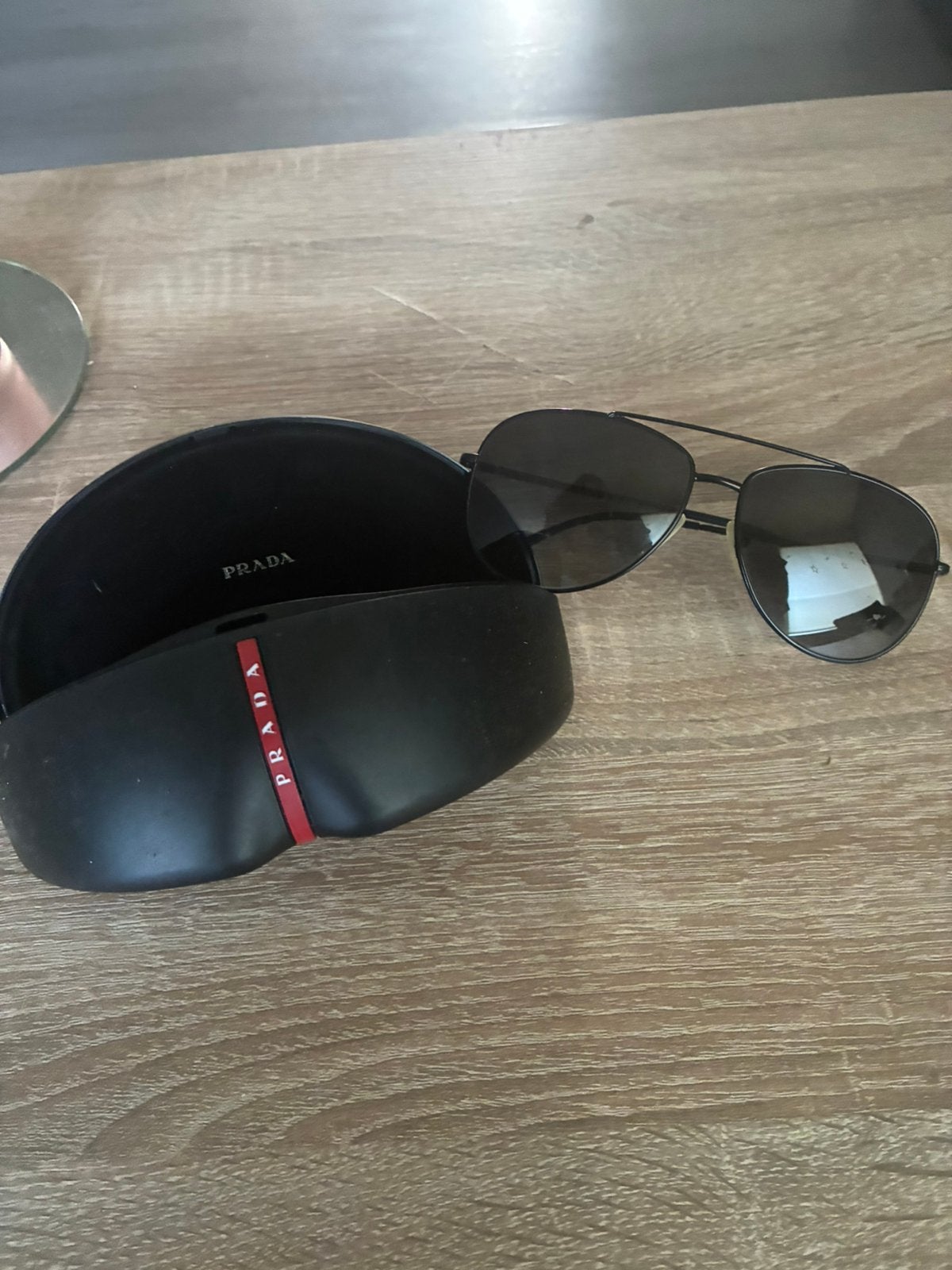 Prada zonnebril, Ophalen of Verzenden, Zo goed als nieuw, Zwart, Overige merken