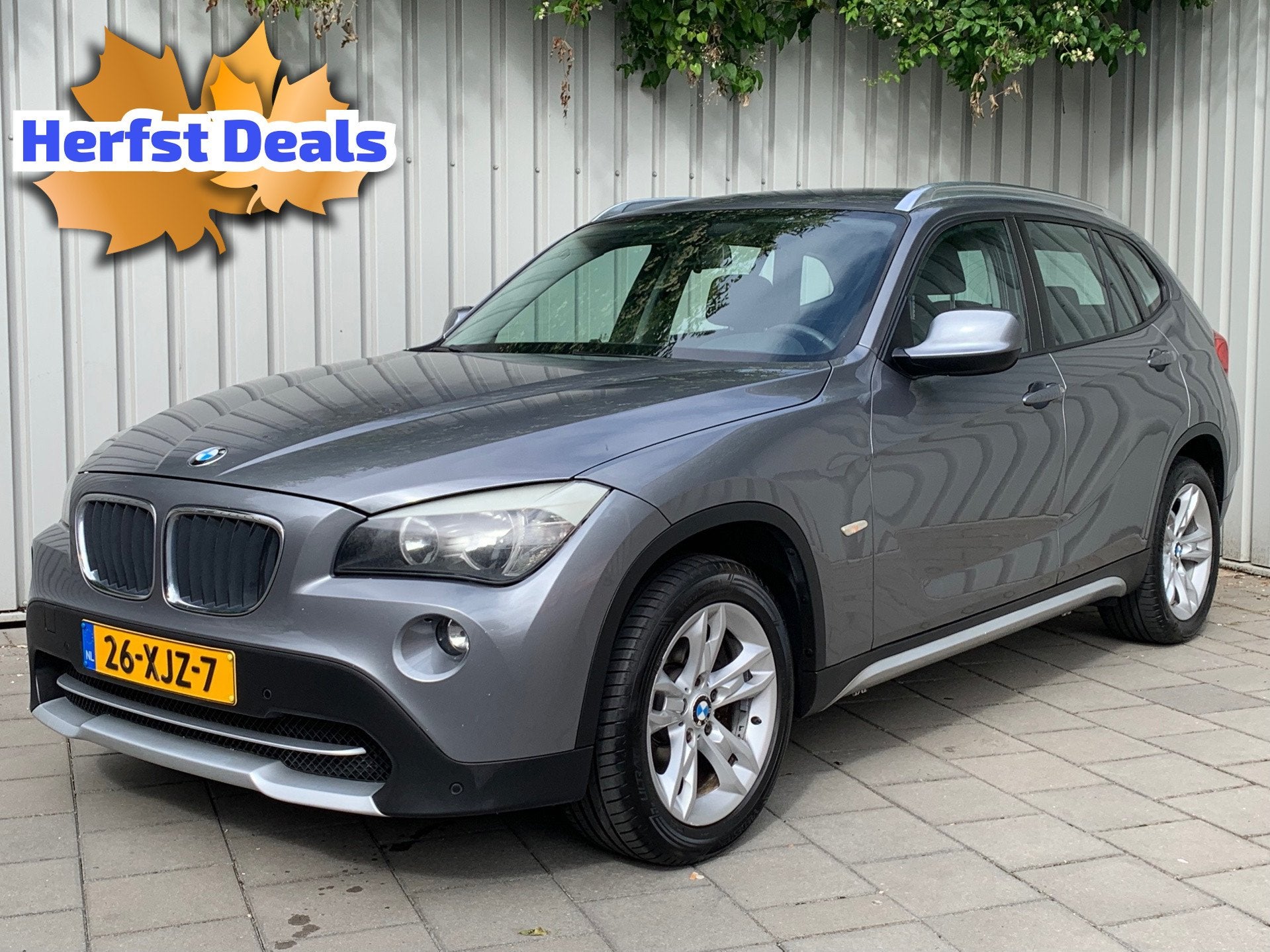 BMW X1 SDrive20i Business|Navigatie|Climate Control|, Auto's, X1, Zwart, 4 cilinders, Handgeschakeld