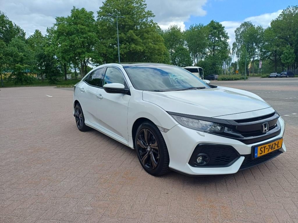 Honda Civic 1.0 I-vtec 129pk   AUTOMAAT, Auto's, Honda, Stof, 129 pk, Bedrijf, 500 kg