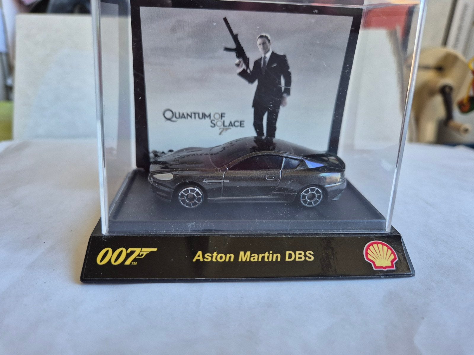 Aston Martin DBS James Bond Shell Collectie 1:64, Verzenden, Nieuw, Auto