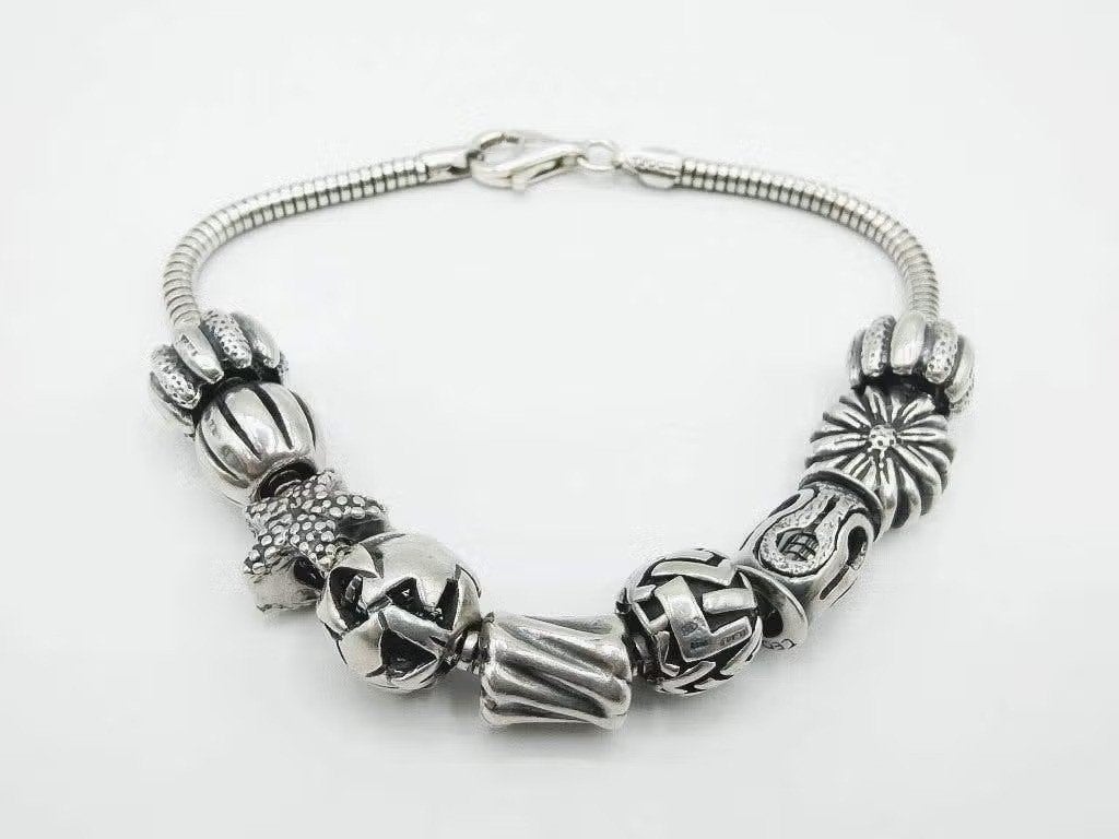 Zilveren armband met bedels, Tedora, 20,5 cm