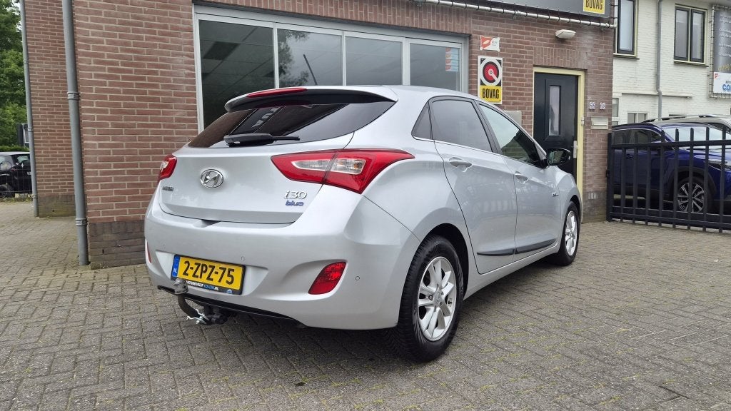 Hyundai i30 1.6 GDI Go!, Trekhaak, Navi NL auto! (bj 2015), Auto's, Hyundai, Keurmerk '100% Onderhouden', Euro 5, Gebruikt, 4 cilinders