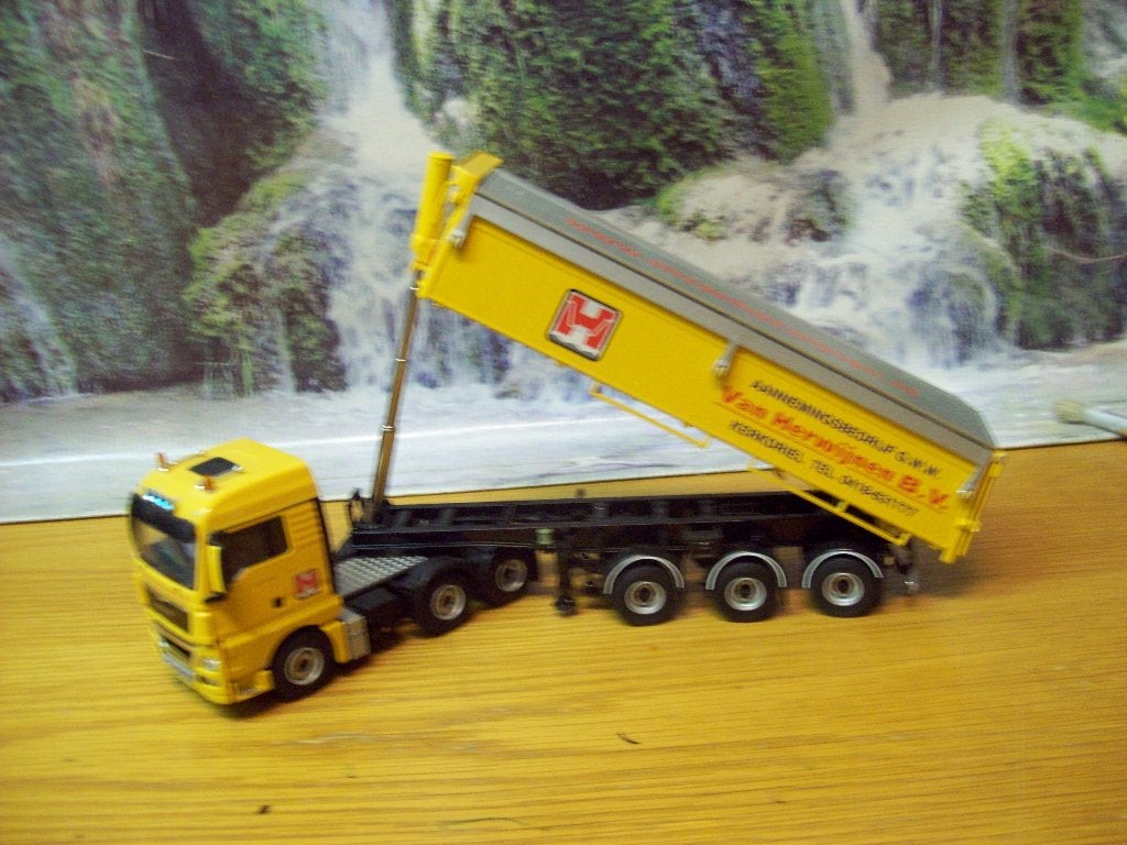 WSI - MAN TGX  met Asfalt Kieper - Herwijnen BV - Kerkdriel, Ophalen of Verzenden, Zo goed als nieuw, Bus of Vrachtwagen, Wsi