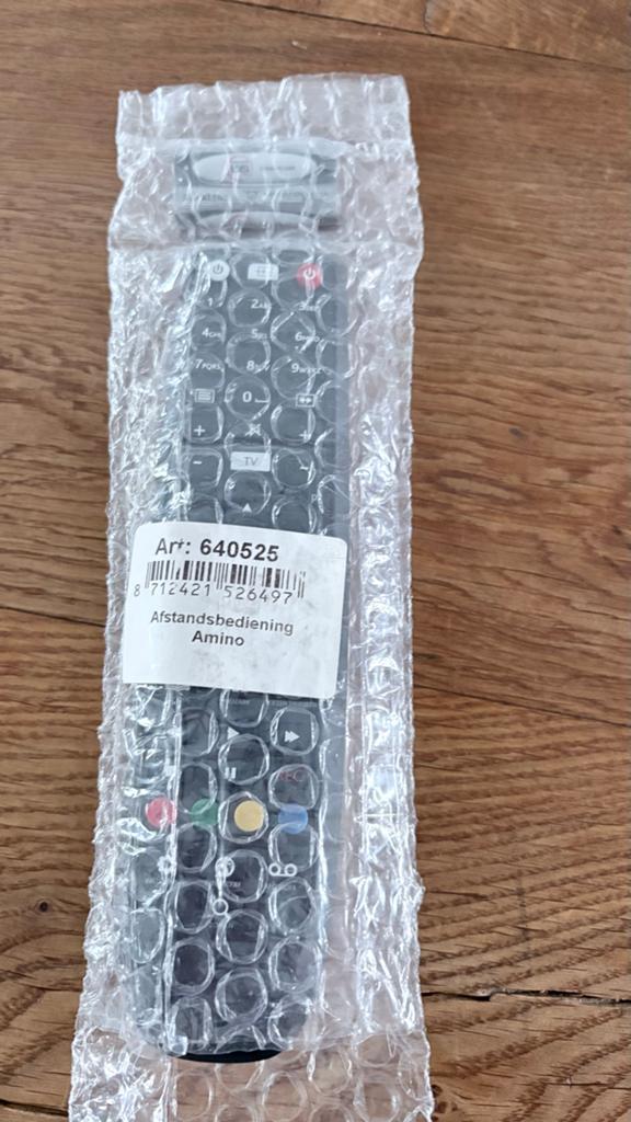 Afstandsbediening Amino (Art: 640525), Ophalen of Verzenden, Zo goed als nieuw, Universeel, Mediaspeler
