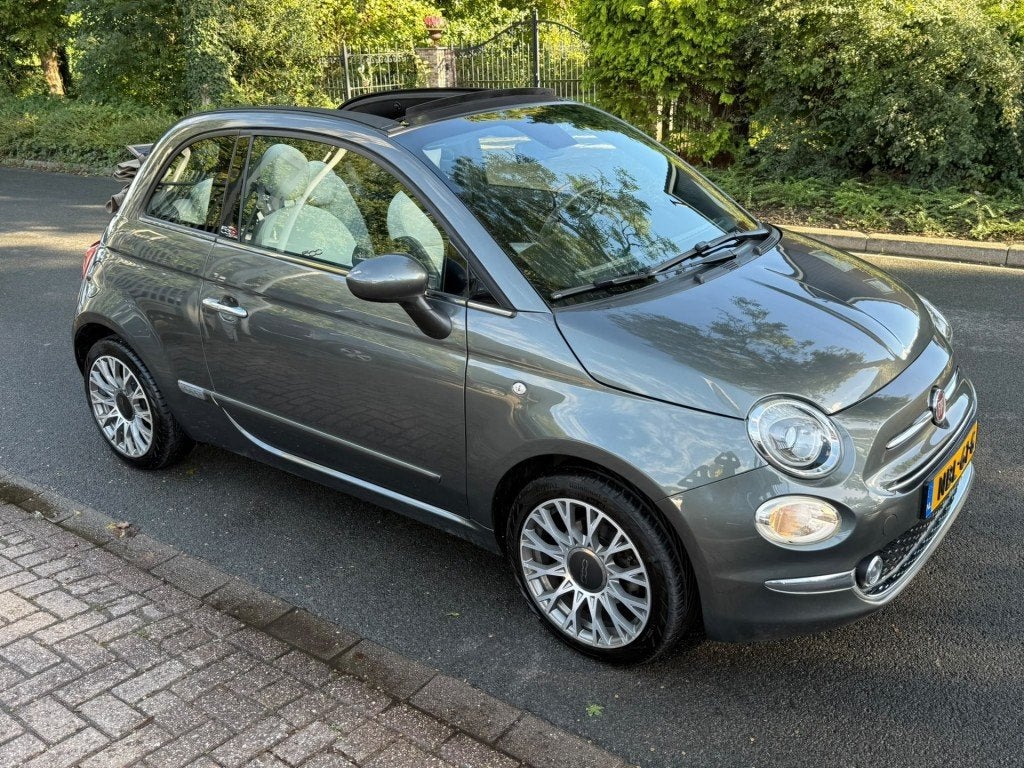 Fiat 500 1.0 Hybrid Lounge / Cabrio Elektrisch Dak / Apple C, Auto's, Voorwielaandrijving, Gebruikt, Met garantie (alle), 4 stoelen