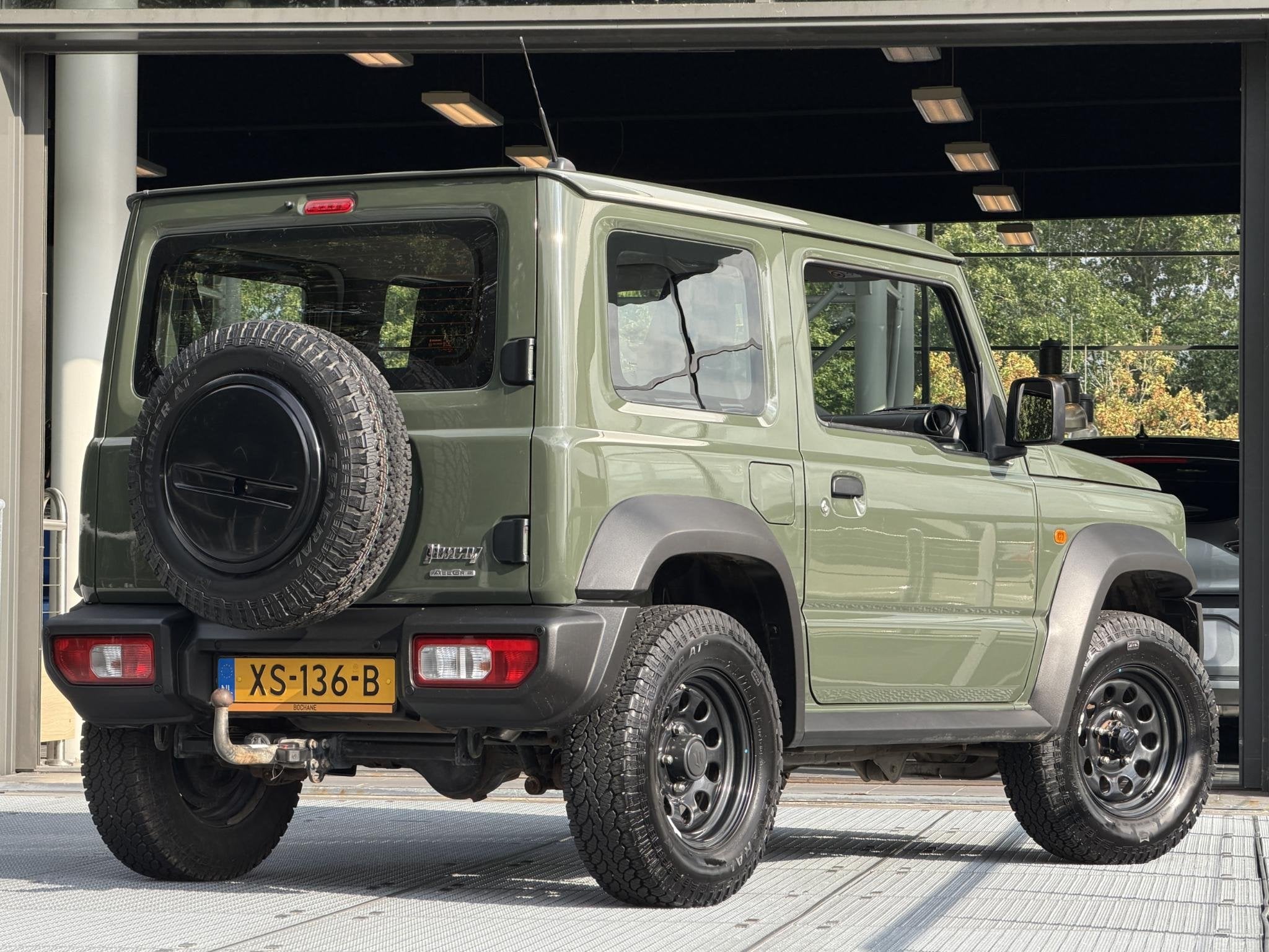 Suzuki Jimny 1.5 Comfort AllGrip 4-zits 102PK | Stoelverwarm, Auto's, Keurmerk '100% Onderhouden', Gebruikt, 4 cilinders, Lichtsensor