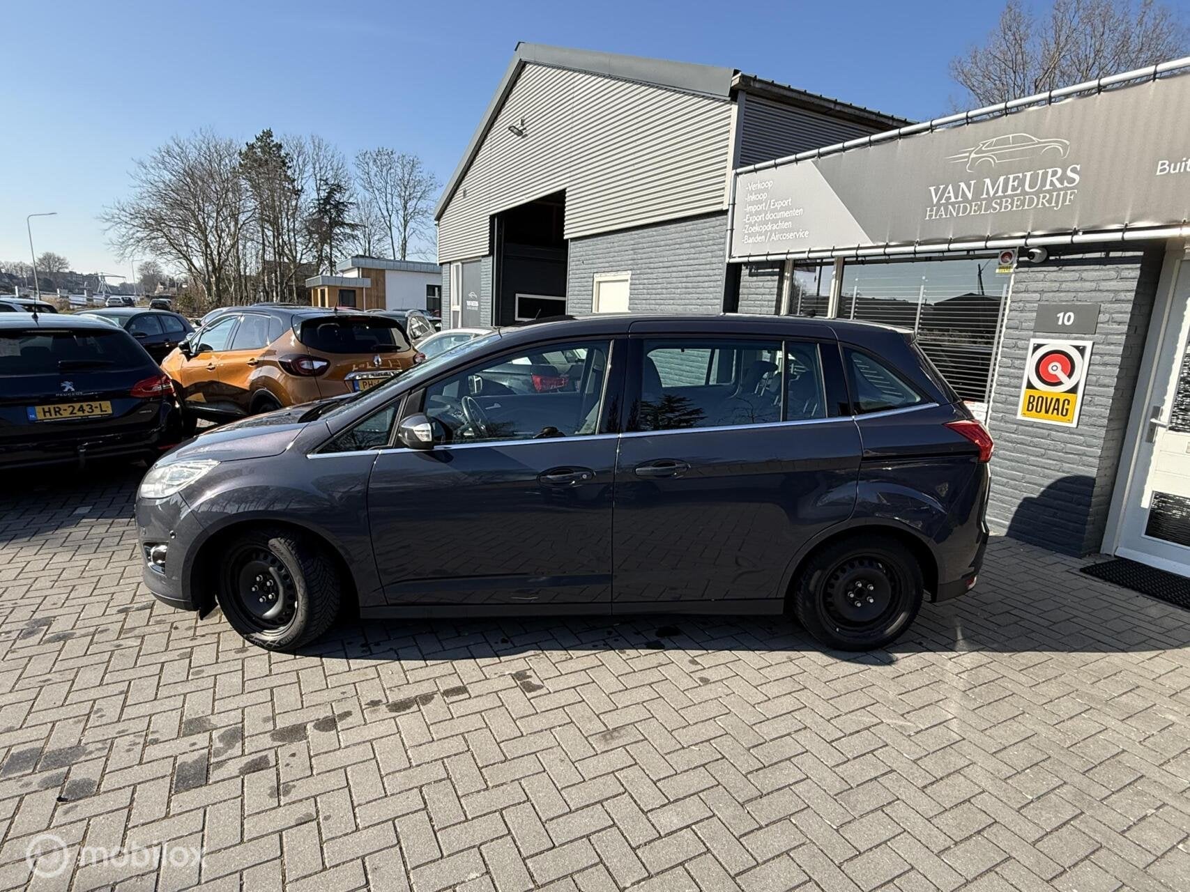 Ford Grand C-Max 1.0 Titanium, Airco, camera, cruise, apk 01, Auto's, Voorwielaandrijving, Gebruikt, Zwart, Start-stop-systeem