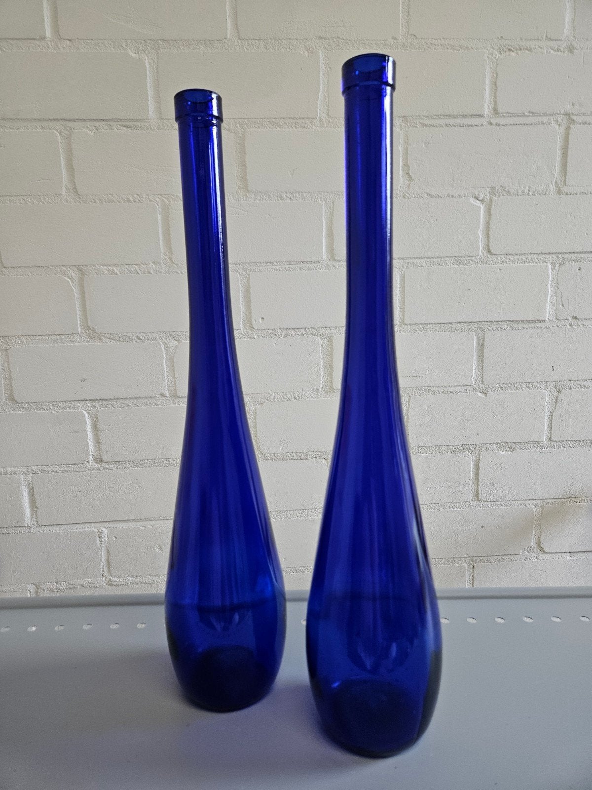 Set prachtige blauwe flessen, Huis en Inrichting, Woonaccessoires | Vazen, Ophalen of Verzenden, Zo goed als nieuw, Blauw, Glas