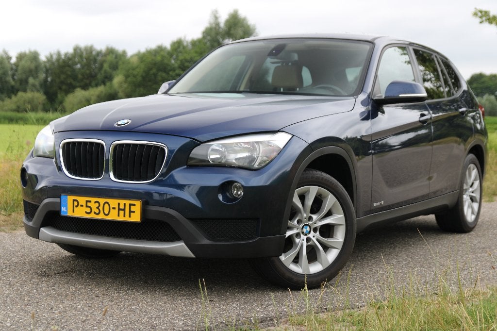 BMW X1 Sdrive 18i,Leder,Navi,Camera,Clima,Cruise,Trekhaak, Auto's, 1995 cc, 4 cilinders, Blauw, Leder