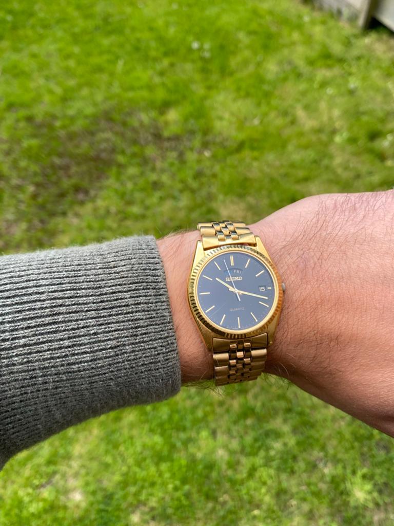 Vintage Seiko 7N43-8110 Gold Tone – Zwarte Wijzerplaat, Gebruikt, Polshorloge, Ophalen of Verzenden, Overige materialen