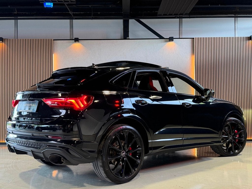 Audi Q3 Sportback TFSI RSQ3 Pano|Trekhaak|Sonos|360|Keyl|Ele, Auto's, Audi, Gebruikt, 1675 kg, Zwart, 10 km/l
