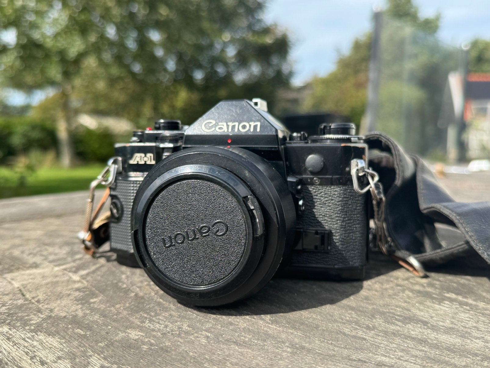 Canon A-1 analoge spiegelreflex + FD 28mm & 100mm + tas, Ophalen of Verzenden, Zo goed als nieuw, Spiegelreflex, Canon