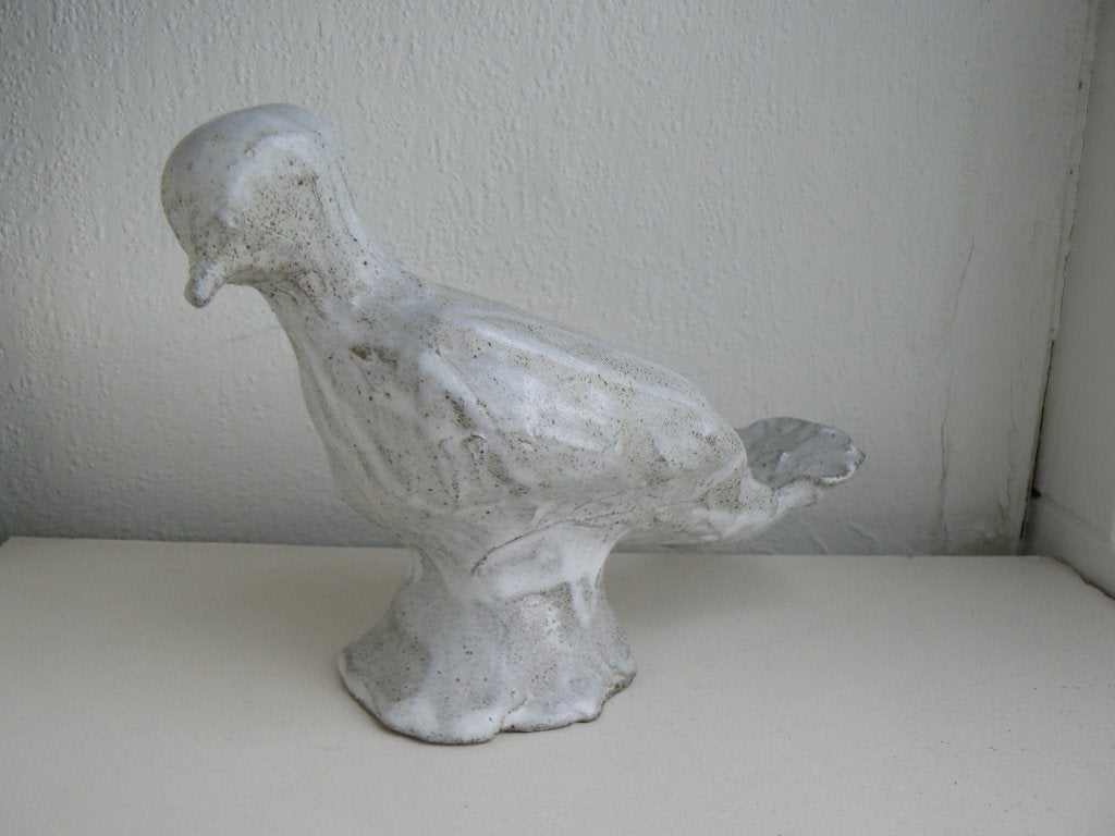 beeldje van een duif, Ophalen