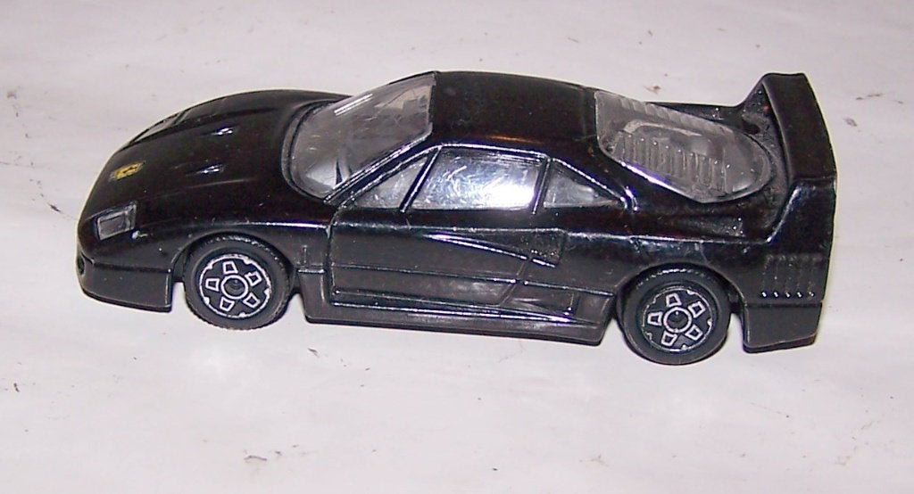 Bburago Ferrari F40. 1/43. Izgs., Hobby en Vrije tijd, Modelauto's | 1:43, Ophalen of Verzenden, Zo goed als nieuw, Auto, Overige merken