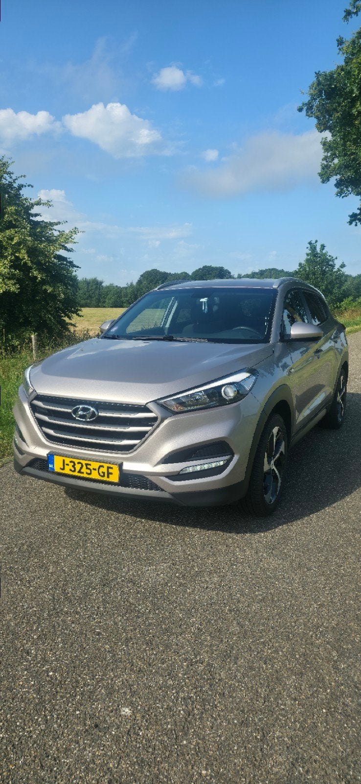 Hyundai Tucson 1.6 GDi 132pk 2016 Wit, Auto's, Voorwielaandrijving, 1591 cc, 4 cilinders, 75 €/maand