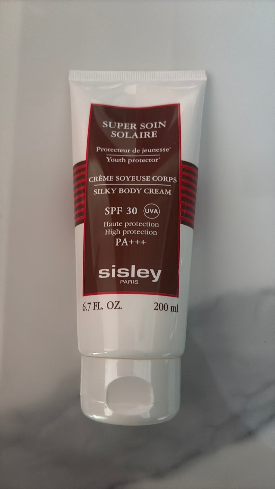 Sisley super soin solair spf 30 200ml nieuw dichtgeseald, Ophalen of Verzenden, Nieuw, Gehele gezicht, Verzorging