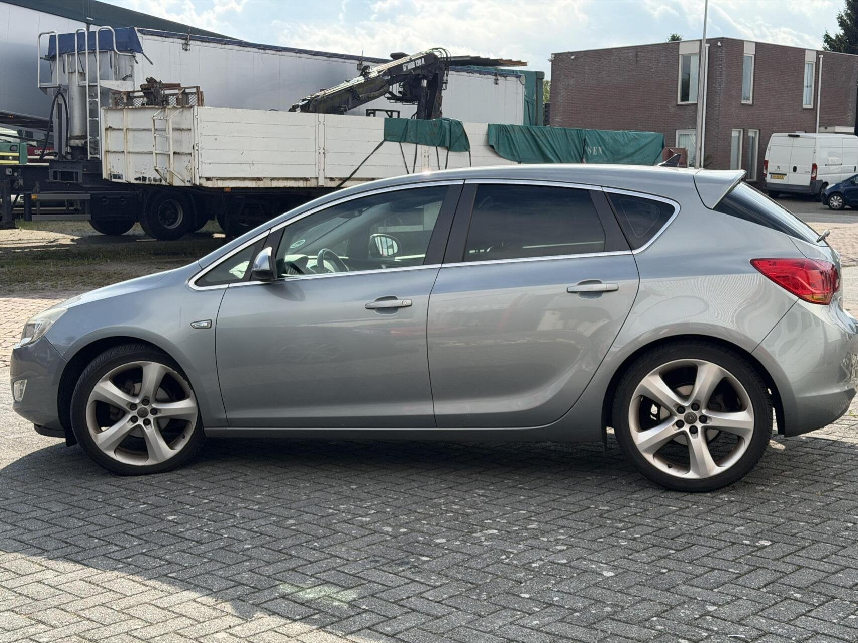 Opel Astra 1.6 Sport Clima/Navi/Leer/Stoelverwarming/LMV/PDC, Auto's, Voorwielaandrijving, Euro 5, 4 cilinders, 116 pk