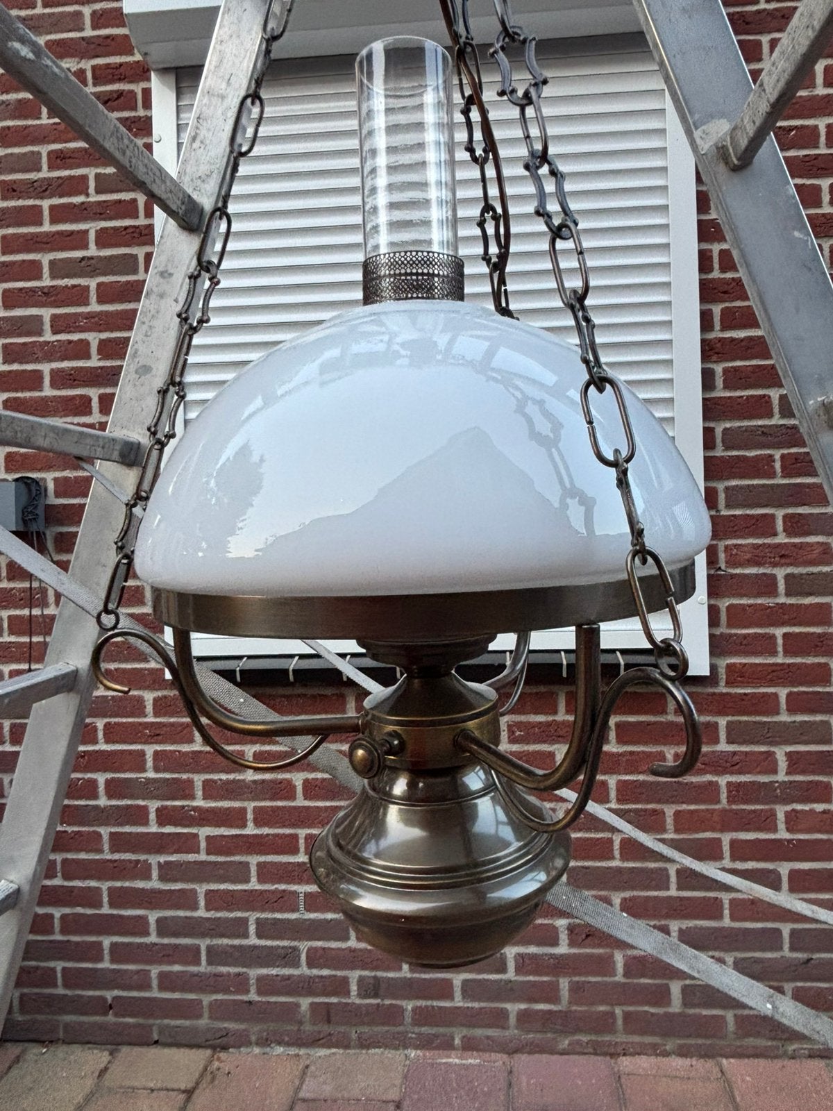 Antieke hanglamp, Ophalen