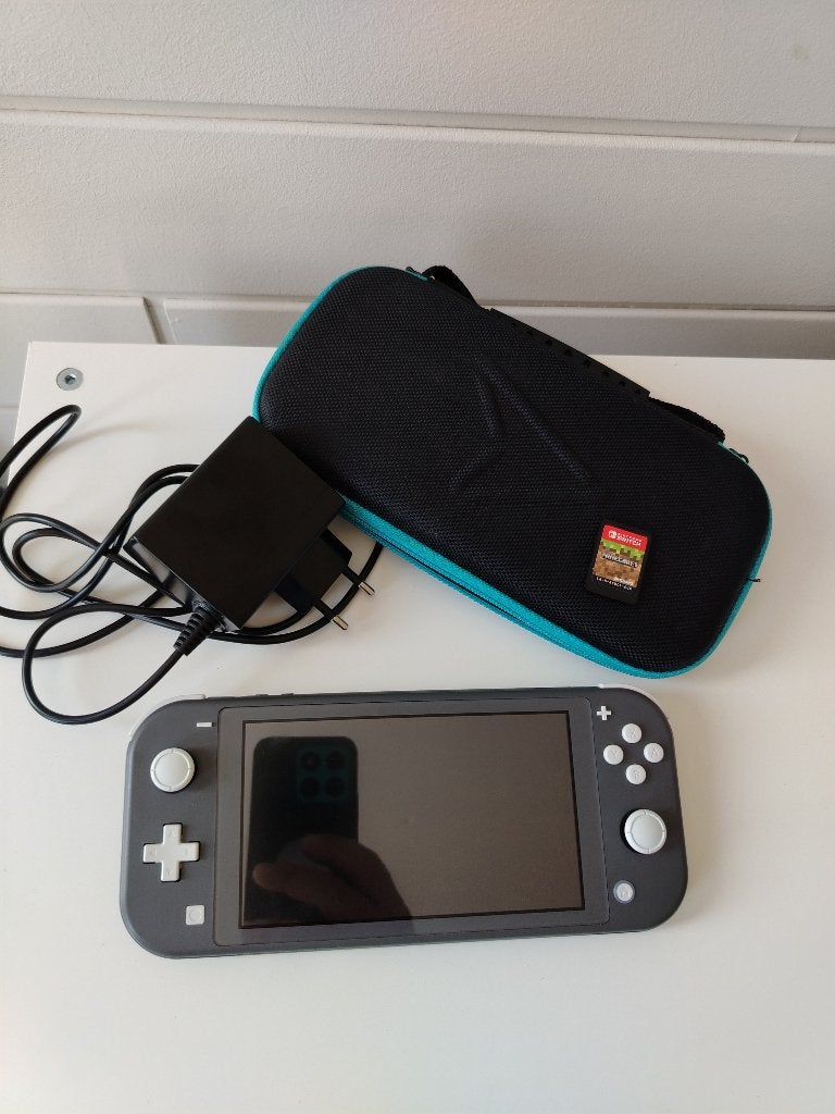 Nintendo Switch Lite (Grijs) + Minecraft + Hoesje & Oplader, Ophalen of Verzenden, Grijs, Zo goed als nieuw, Met beschermhoes of tas