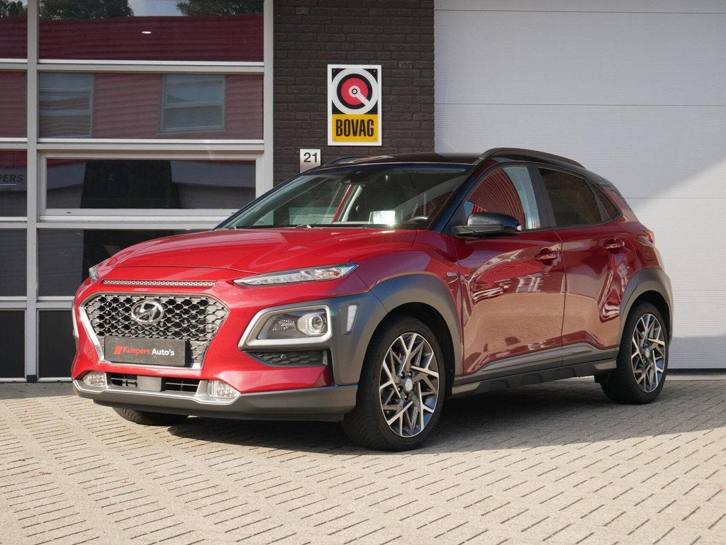 Hyundai Kona 1.6 GDI HEV Premium Sky Leder| Trekhaak| HUD, Auto's, Hyundai, Gebruikt, Zwart, Automatische klimaatregeling, Leder