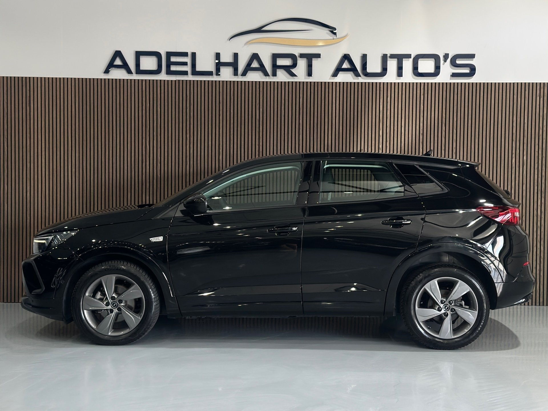 Opel Grandland 1.2 Turbo Automaat Business Elégance / Navig, Auto's, Gebruikt, Zwart, 1199 cc, Automatische klimaatregeling