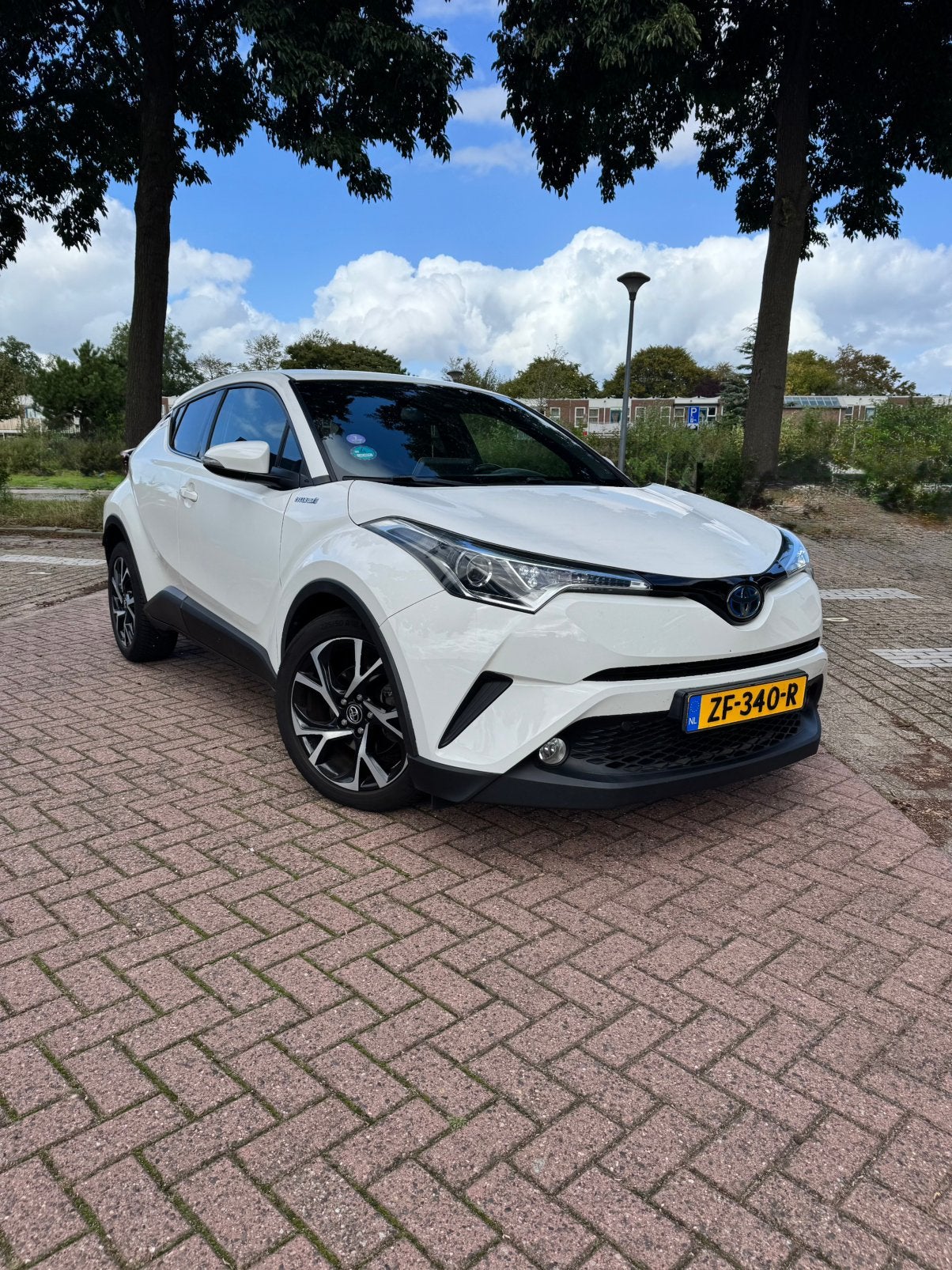 Toyota C-HR 1.8 Hybrid/Benzine 122pk CVT 2019 Wit, Stof, 725 kg, Zwart, 4 cilinders