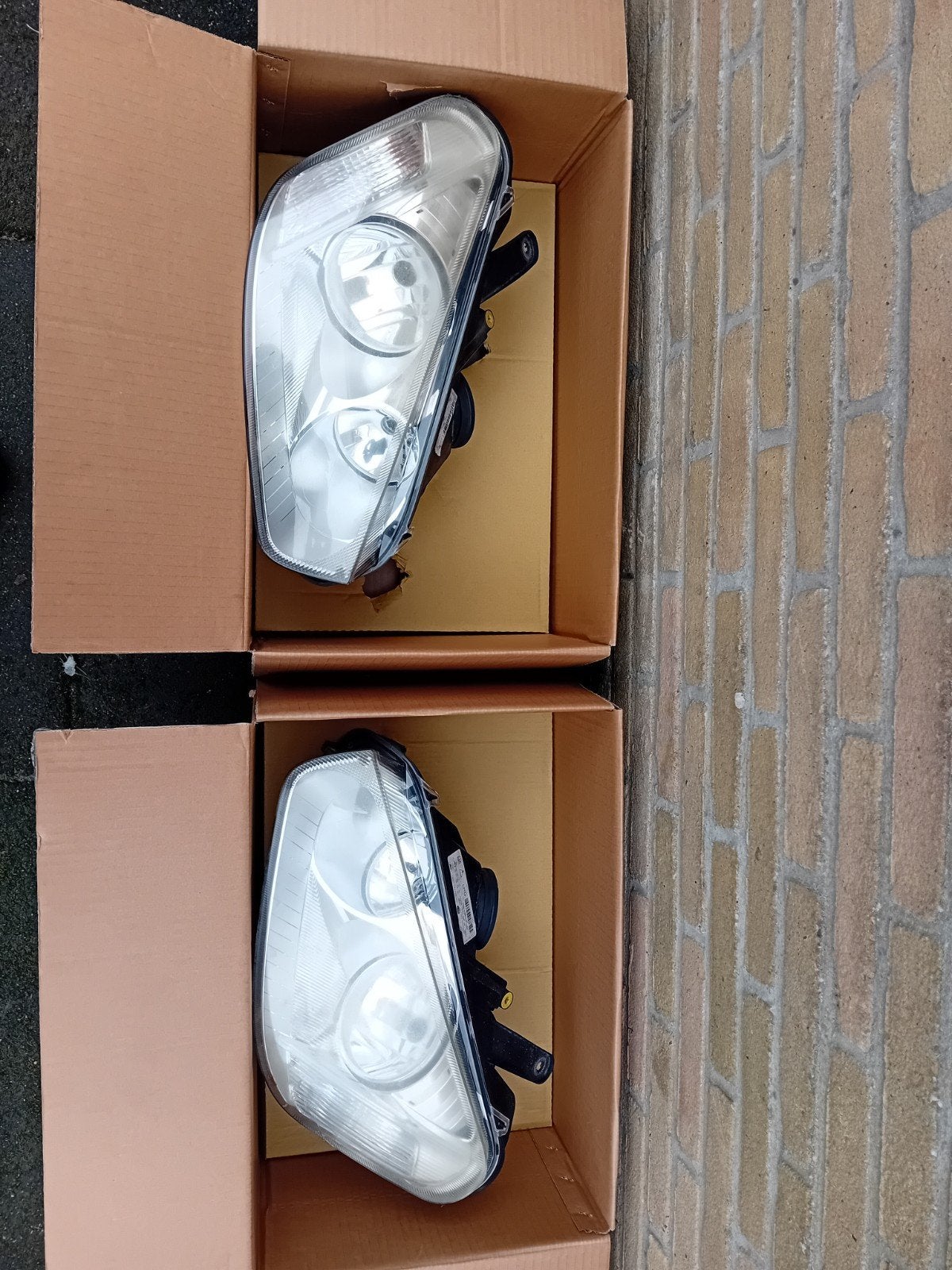 Ford Focus C-Max koplampen (set) - Hella 7M51-13W030-AD, Ophalen of Verzenden