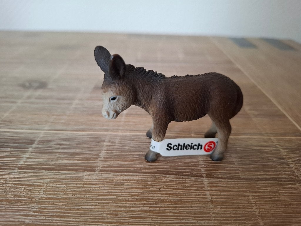 Schleich 13268 Farm Life ezel veulen met label, Ophalen of Verzenden, Zo goed als nieuw