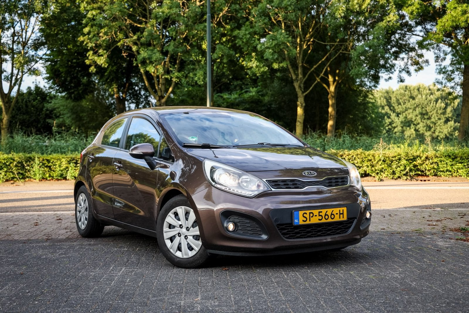 Kia rio 1.2 | APK | AIRCO | CRUISE | PDC | 139707KM, Auto's, 450 kg, 4 cilinders, Bruin, 49 €/maand