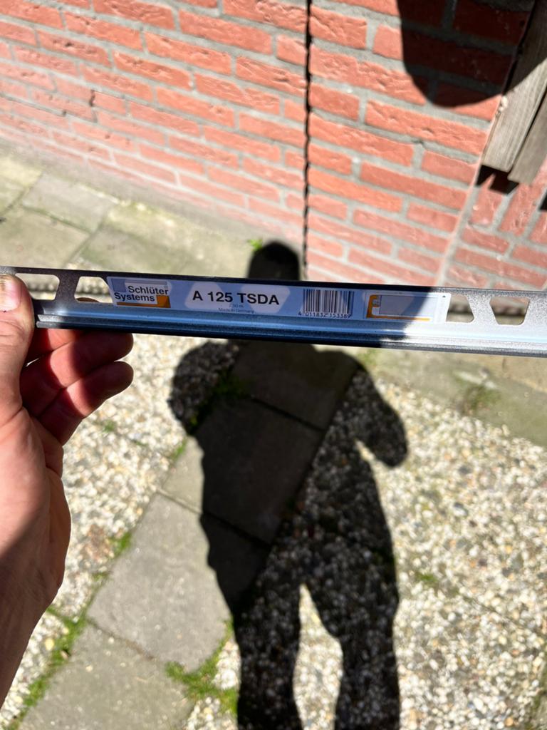 Schlüter Antraciet tegelafwerkstrip 10 mm h, 175 cm lang, Doe-het-zelf en Verbouw, Tegels, Ophalen, Nieuw, Minder dan 20 cm, Minder dan 5 m²