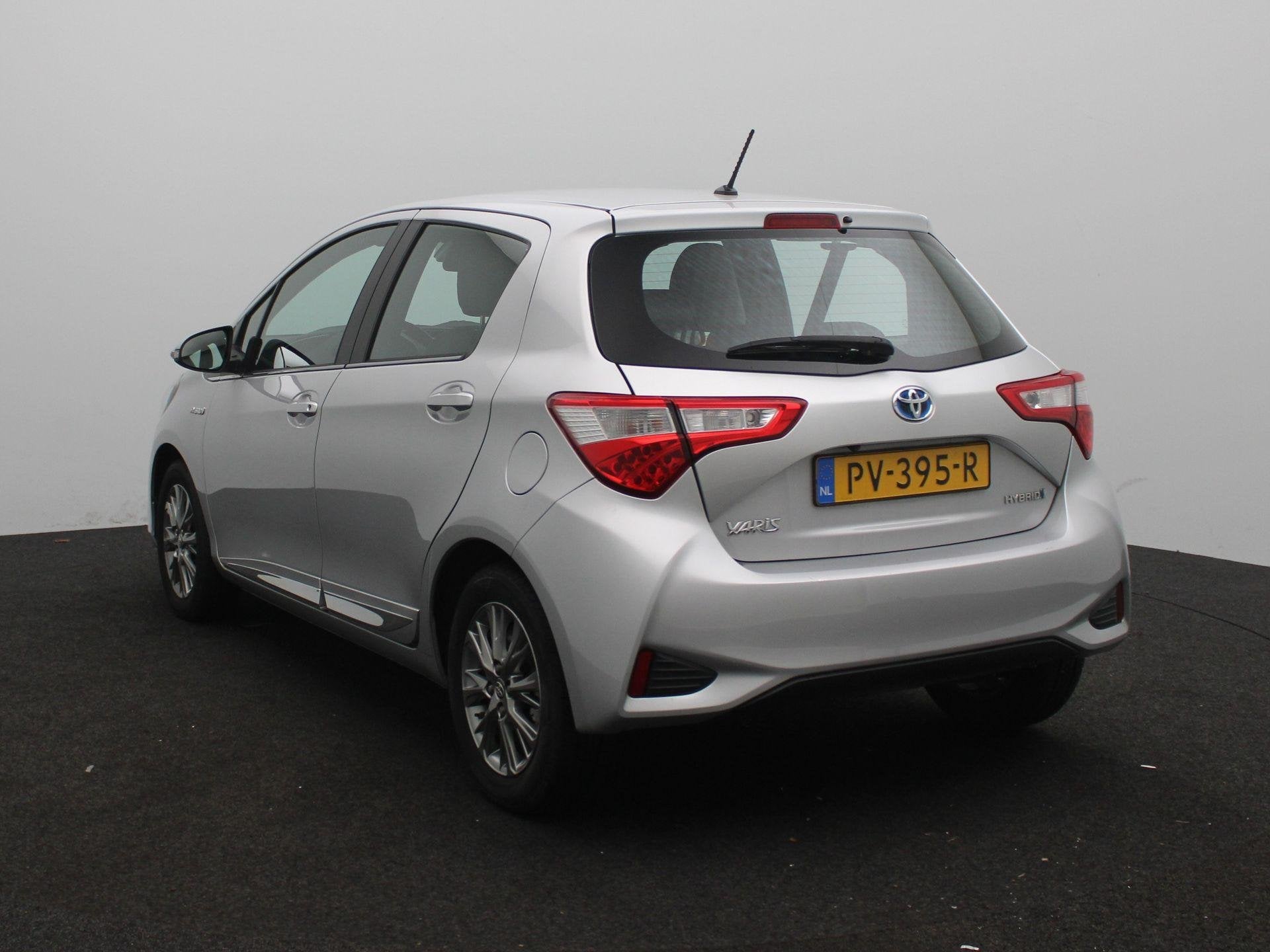 Toyota Yaris 1.5 Hybrid Executive | Automaat | Achteruitrijc, Auto's, 12 maanden, Gebruikt, Euro 6, 4 cilinders
