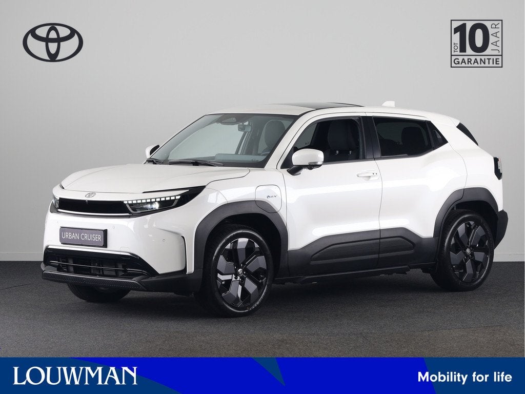 Toyota Urban Cruiser Executive 61 kWh *NIEUW* | Direct lever, Auto's, Toyota, 12 maanden, Leder en Stof, Wit, Origineel Nederlands