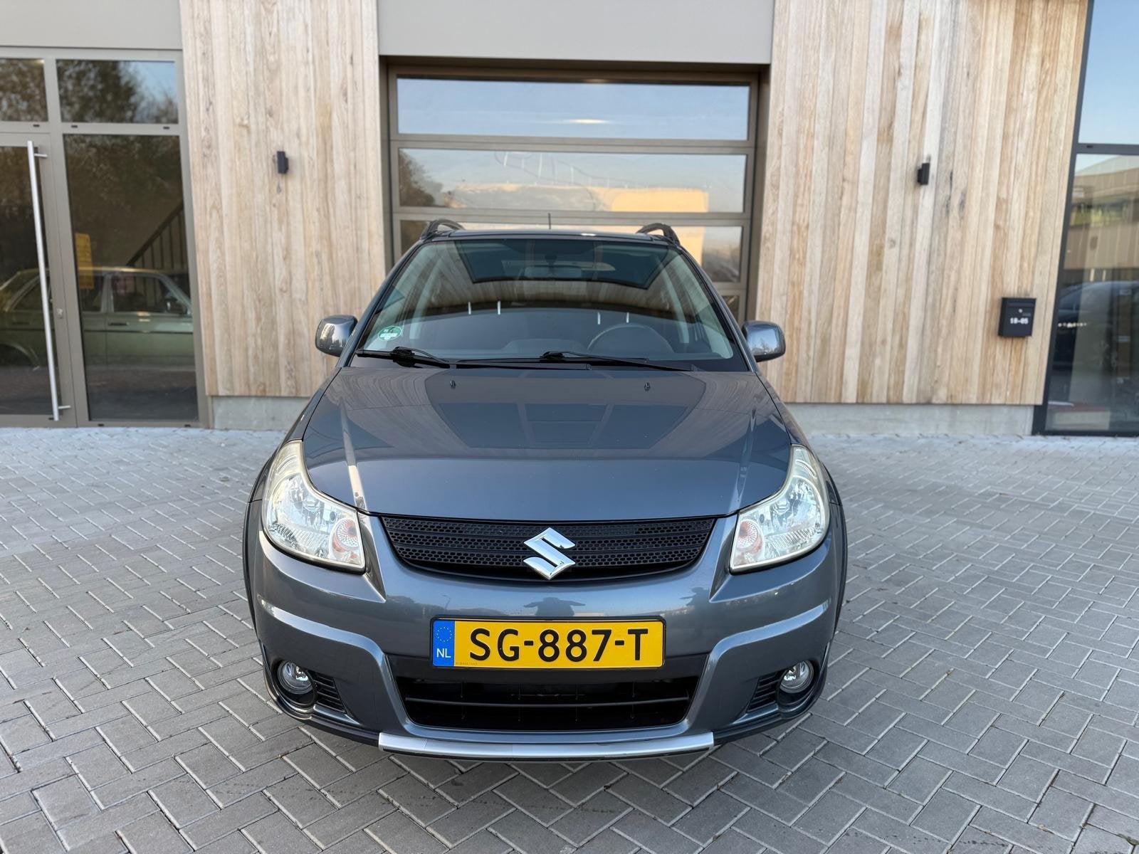 Suzuki SX4 1.6 Comfort 5drs|Airco|Stoelverwarming|Trekhaak|N, Gebruikt, Zwart, 4 cilinders, Handgeschakeld