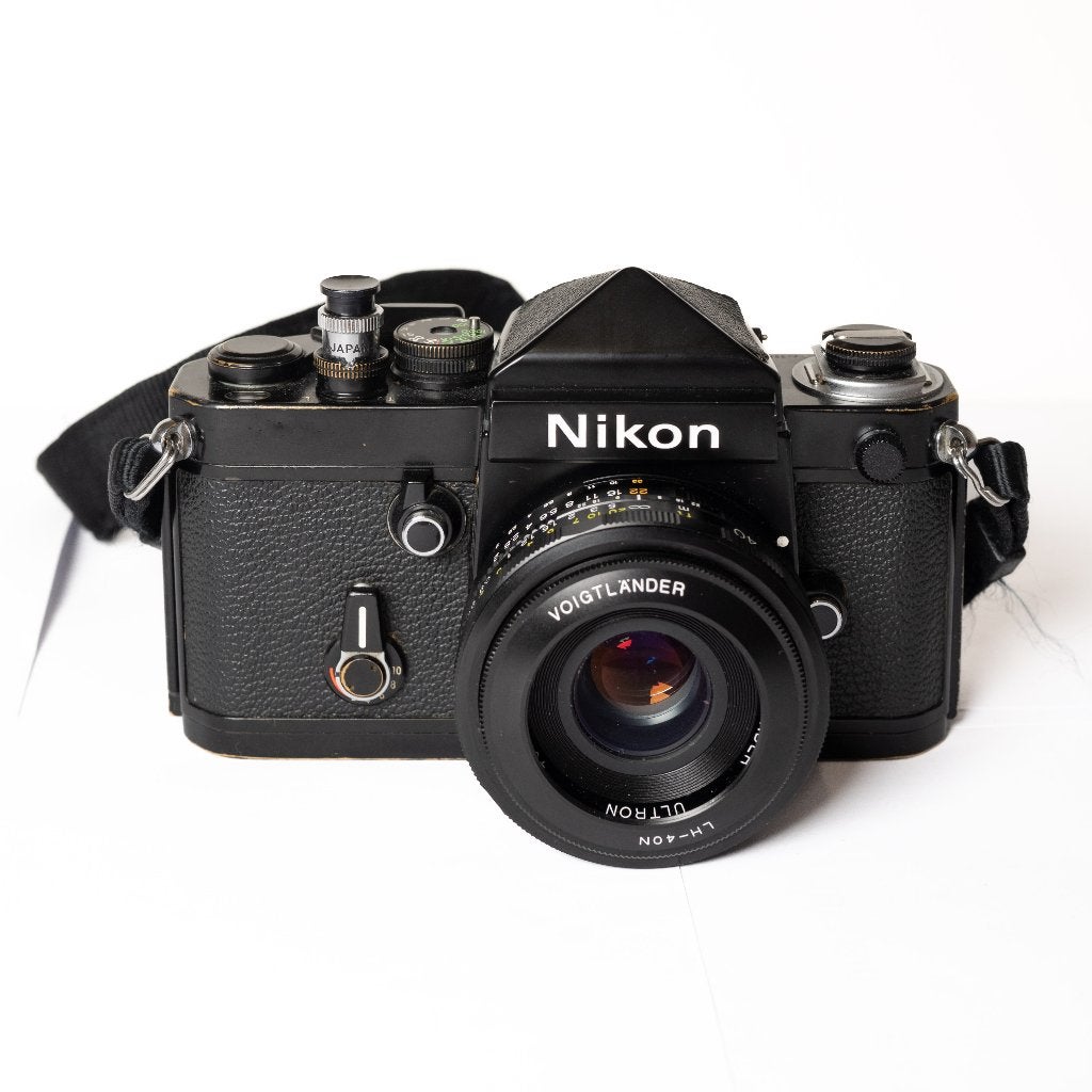 Nikon F2 black + DE-1 prism — tested, Audio, Tv en Foto, Fotocamera's Analoog, Ophalen of Verzenden, Compact, Overige Merken