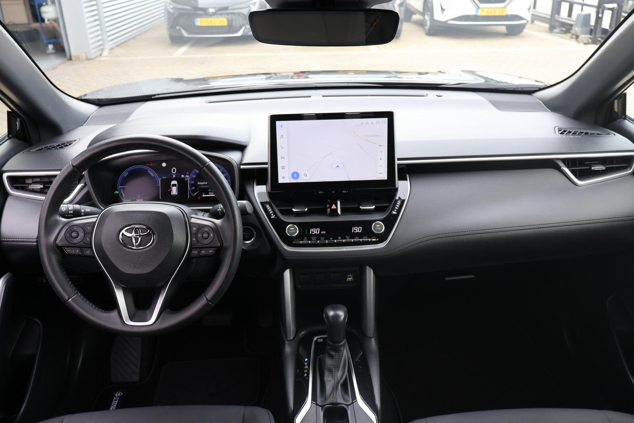 Toyota Corolla Cross 2.0 High Power Hybrid Active 1e Eigenaa, Stof, Gebruikt, 4 cilinders, Zwart
