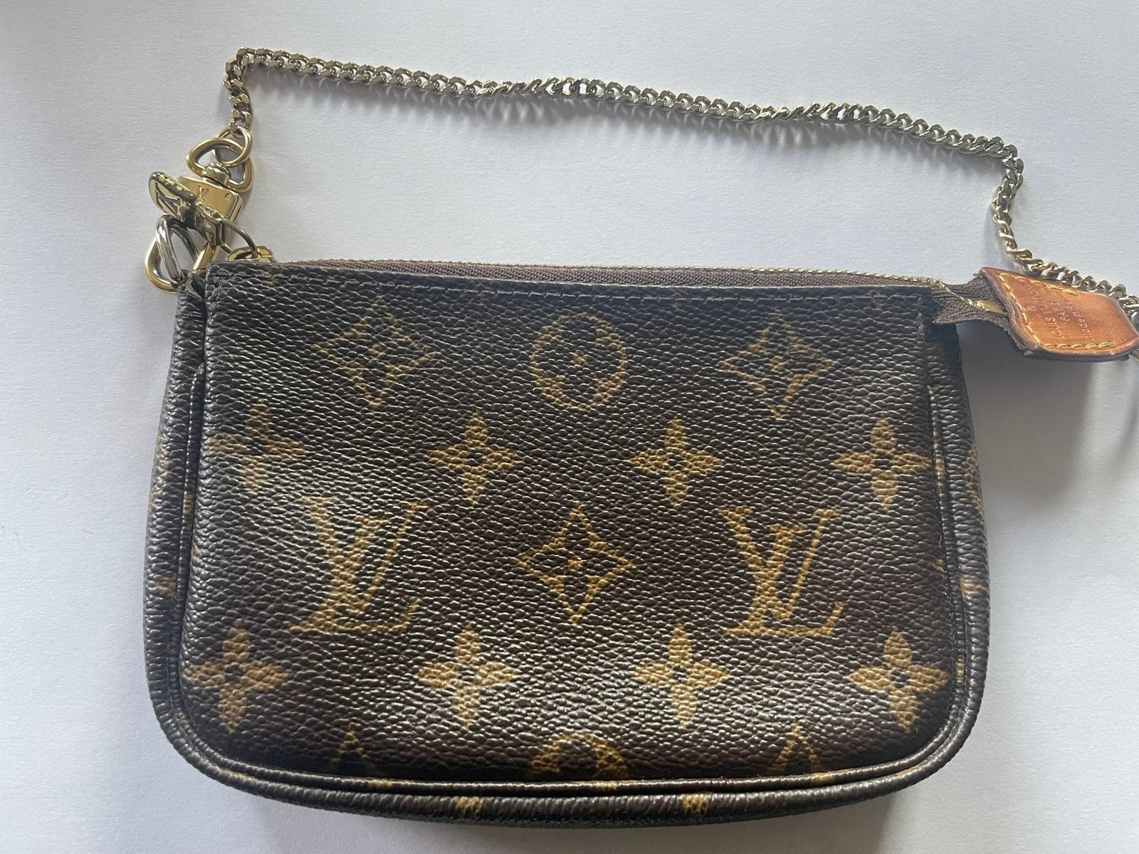 Louis Vuitton DUO111 mini pochette monogram, Ophalen of Verzenden, Zo goed als nieuw, Bruin, Leer