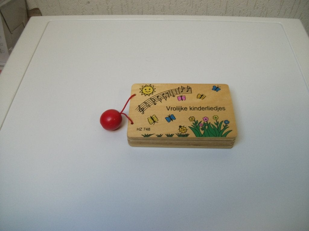 Hout boekje vrolijke kinderliedjes HZ748, Ophalen of Verzenden, Gebruikt