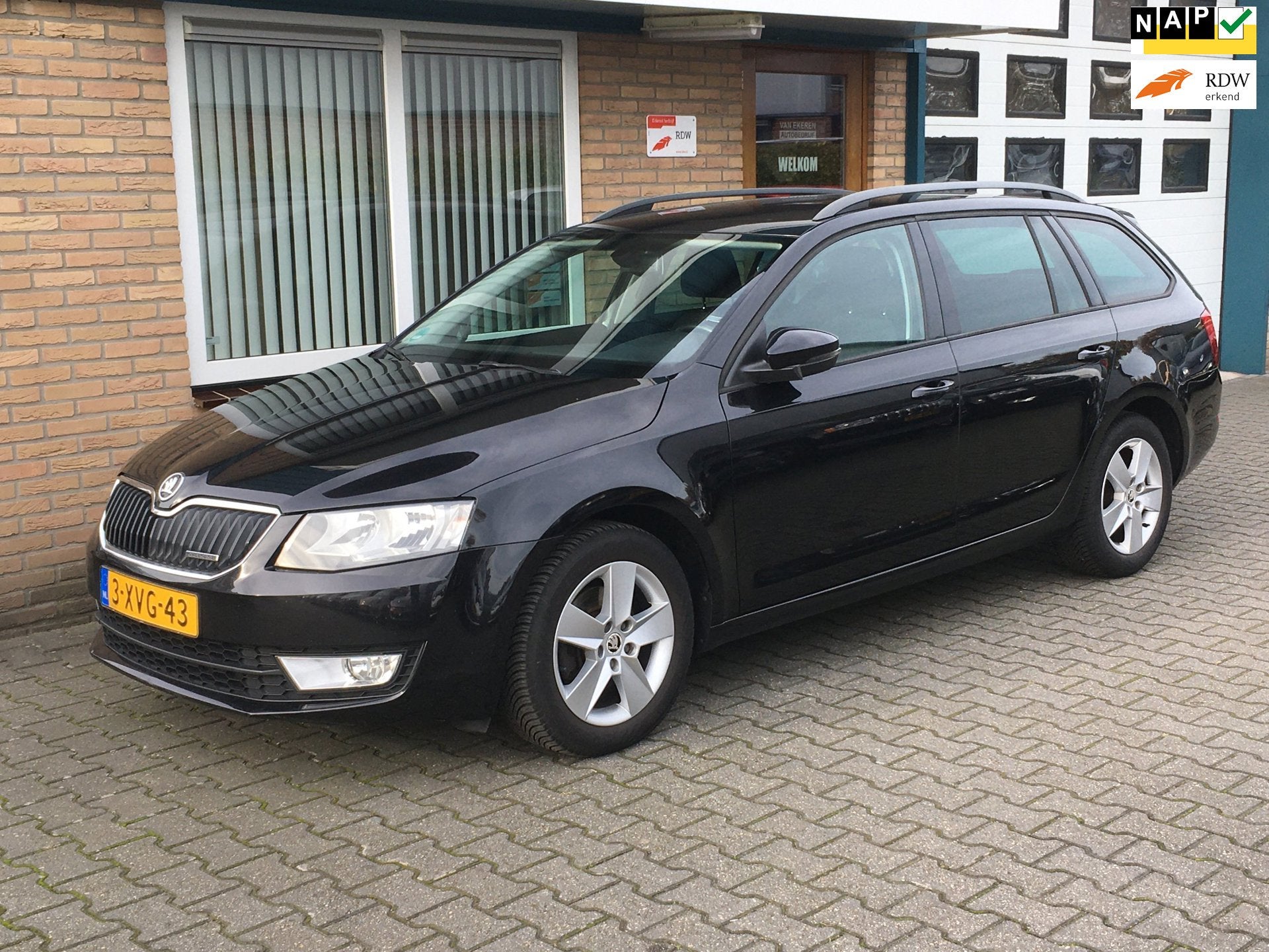Skoda Octavia Combi 1.6 TDI Greenline Businessline, Auto's, Euro 5, Stof, Gebruikt, Zwart