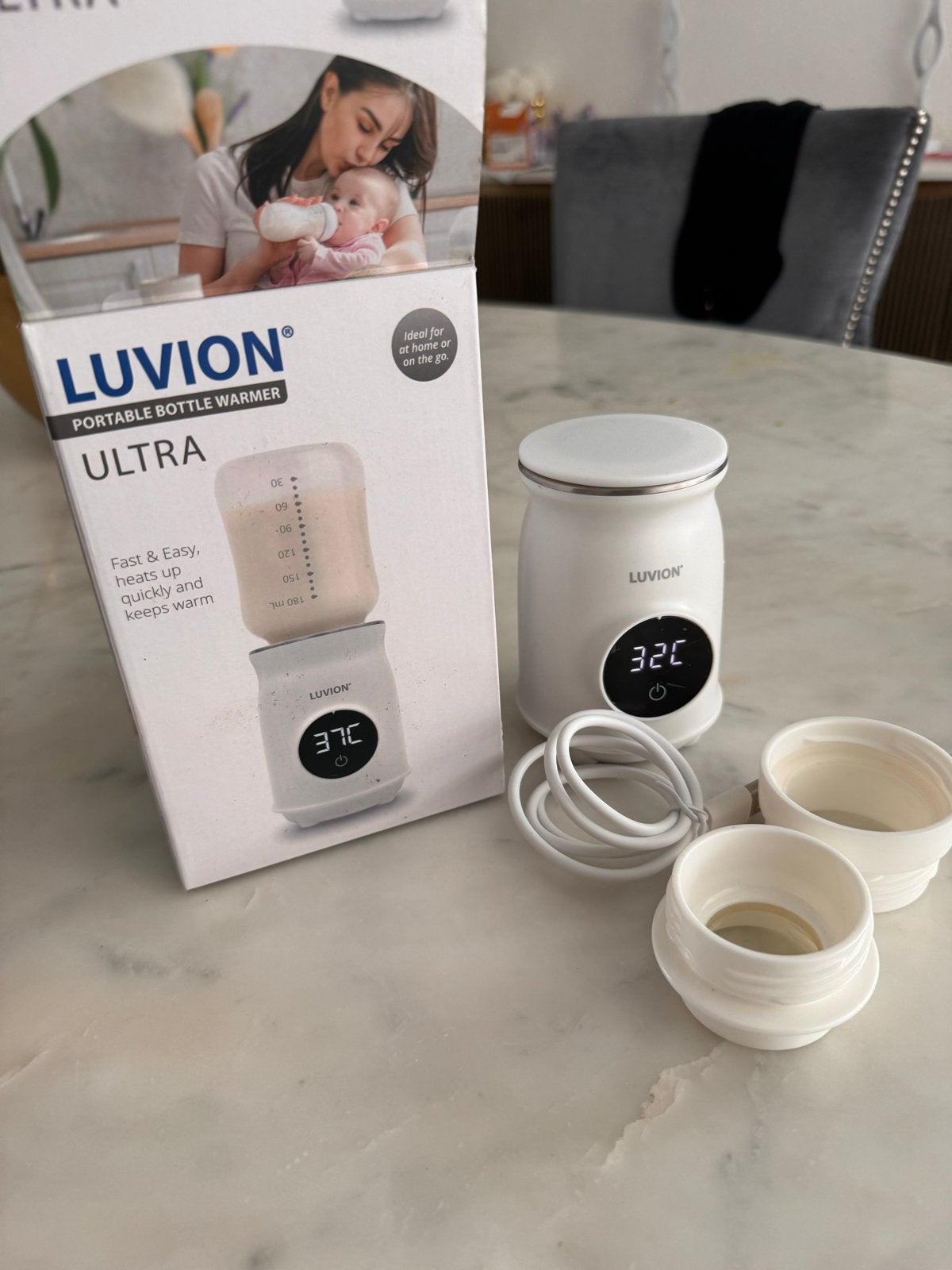 Luvion Ultra Draagbare Flessenwarmer voor onderweg en thuis, Ophalen, Flessen- of potjesverwarmer, Luvion, Zo goed als nieuw