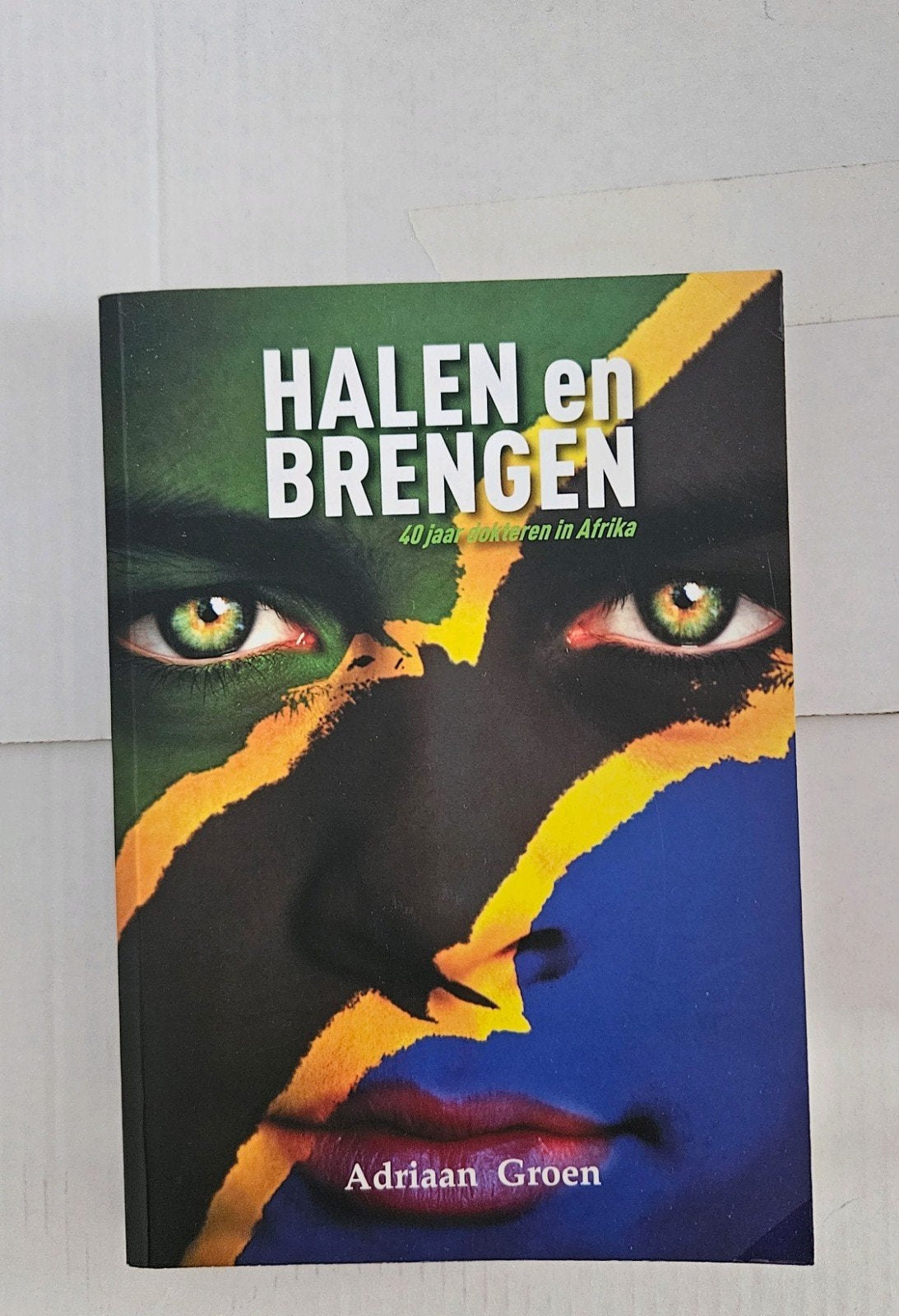 Halen en Brengen - 40 jaar avonturen in Afrika, Ophalen of Verzenden, Zo goed als nieuw, Adriaan Groen, Nederland