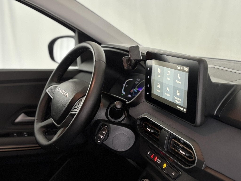 Dacia Jogger 1.6 Hybrid 140 Extreme 7-persoons | Apple-Andro, Auto's, Dacia, Gebruikt, 4 cilinders, Wit, Origineel Nederlands