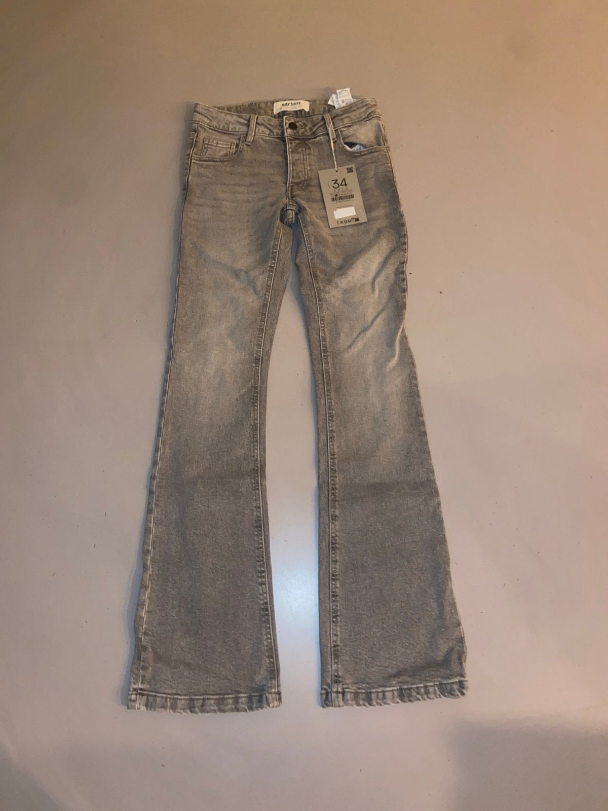 Stradivarius Low Rise Flare Fit Jeans Maat 34, Ophalen of Verzenden, Zo goed als nieuw, Grijs, W27 (confectie 34) of kleiner