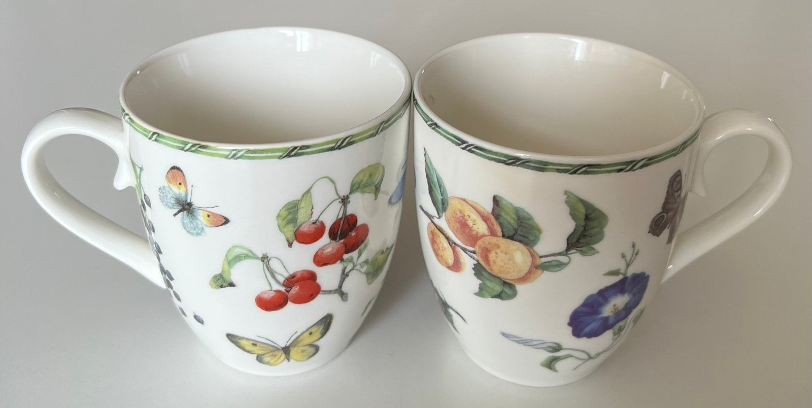 2 porseleinen mokken Janneke Brinkman Fruit&Flowers, Ophalen of Verzenden, Zo goed als nieuw, Overige stijlen, Kop(pen) en/of Schotel(s)