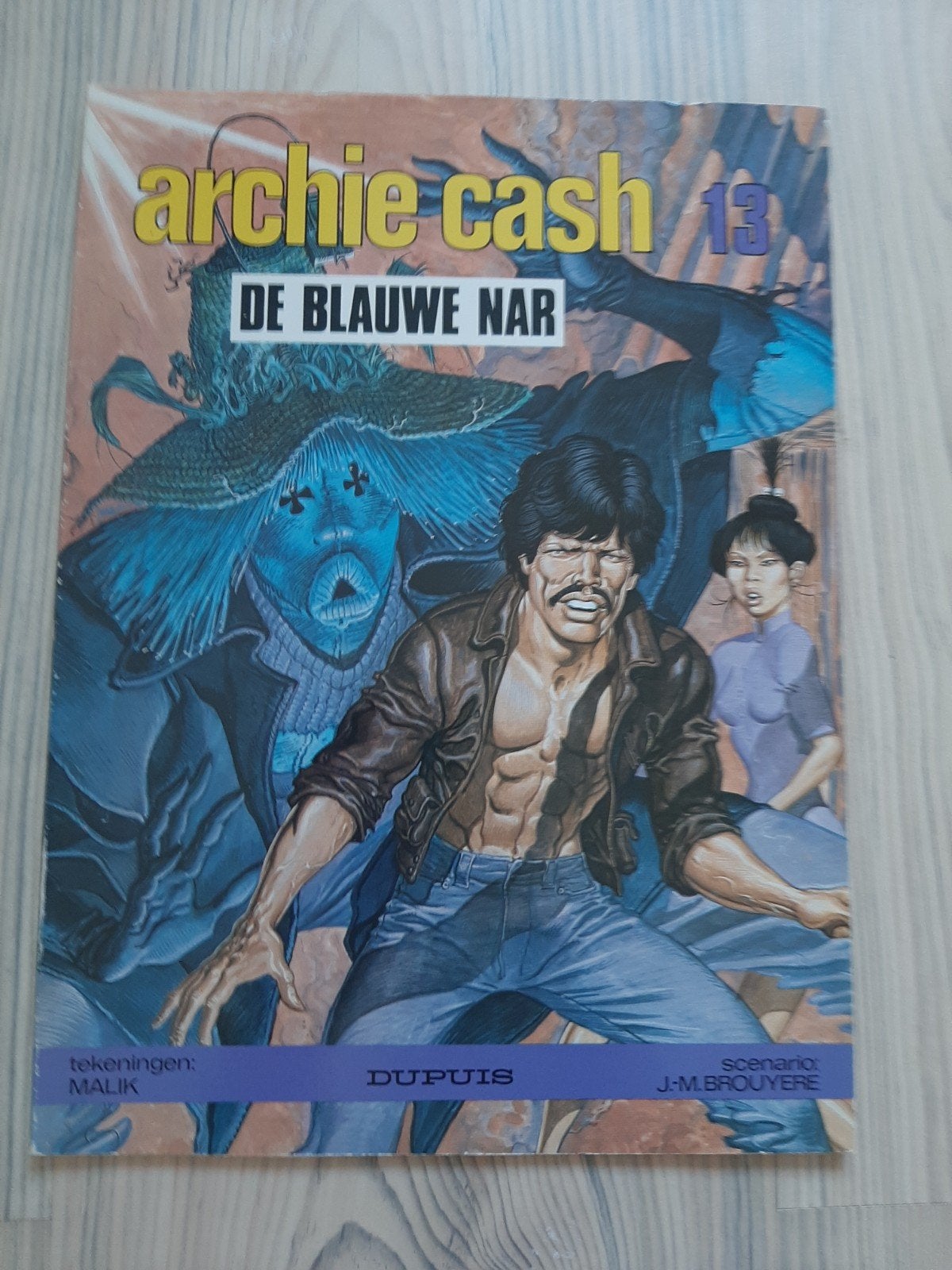 Archie Cash 13 - De Blauwe Nar - Stripboek, Eén stripboek, Ophalen of Verzenden, Gelezen, Malik, J-M. Brouyere