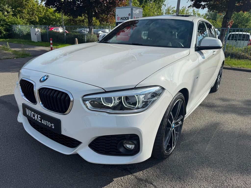 BMW 1-serie 118i Edition M Sport Shadow Executive Dakje Lede, Gebruikt, Wit, Bedrijf, 650 kg